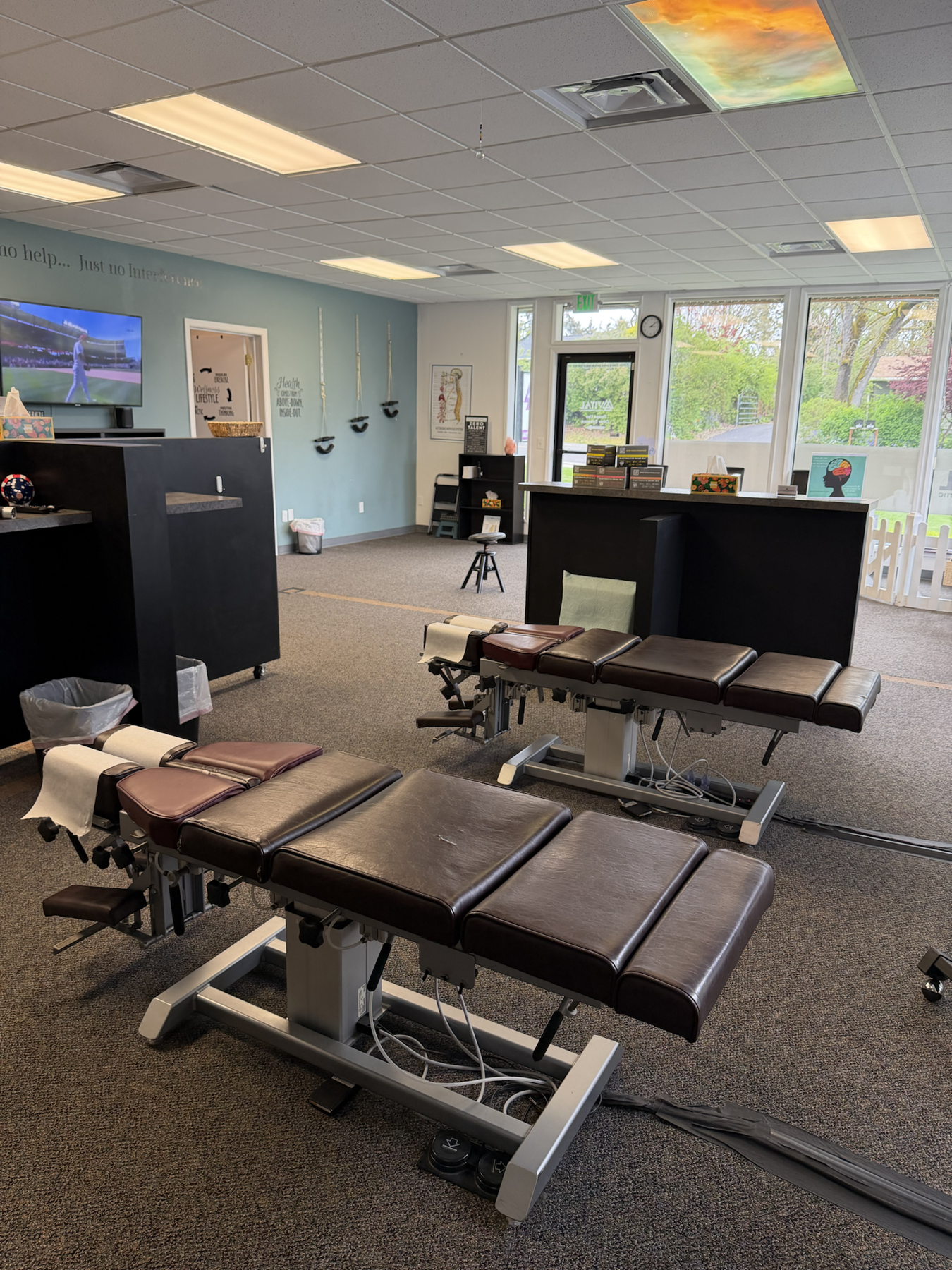 Treatment bay with adjustment tables at True Health Chiropractic